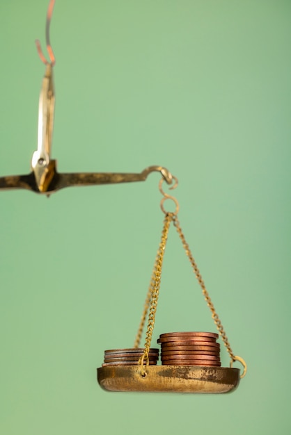 An image showing scales balancing money and tax forms, symbolizing the equilibrium taxpayers aim for when filing their returns.