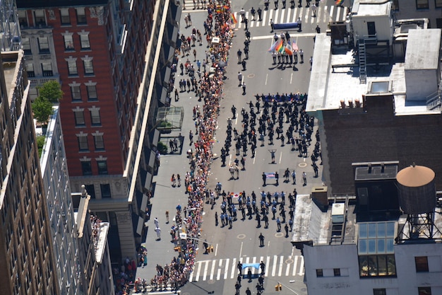 An aerial view of a protest outside a government building, with signs and banners criticizing campaign finance laws and advocating for reform, highlighting the public's desire for greater transparency and accountability in political spending.