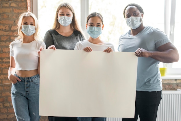 A diverse group of people symbolizing patient advocates, holding signs with slogans supporting affordable healthcare. The scene is set against the backdrop of a government building, emphasizing their efforts to influence healthcare policy.