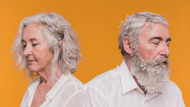 A split image showing two contrasting scenarios: on one side, an older person looking worried while reviewing bills, and on the other side, the same person smiling while using a calculator, symbolizing the potential relief from the COLA increase.